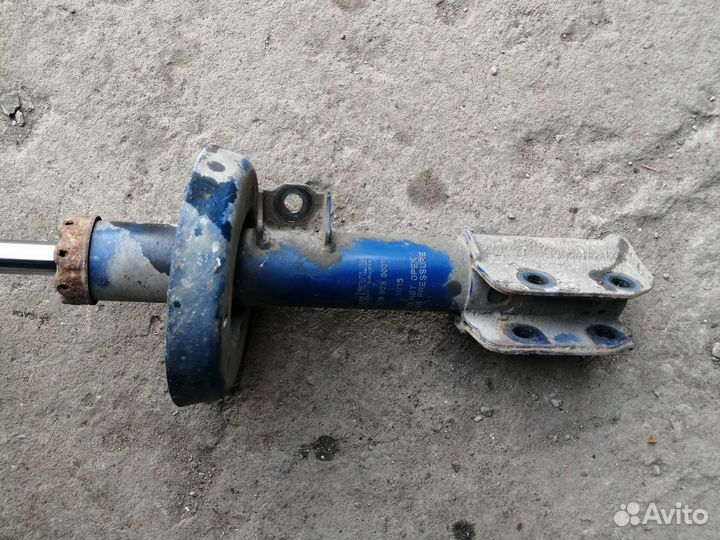 Стойка амортизатор opel astra G левый