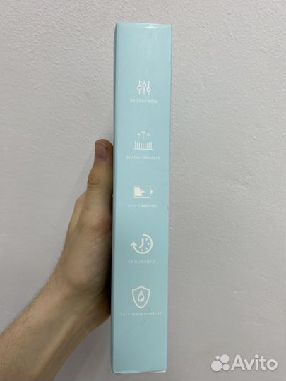 Электрическая зубная щётка