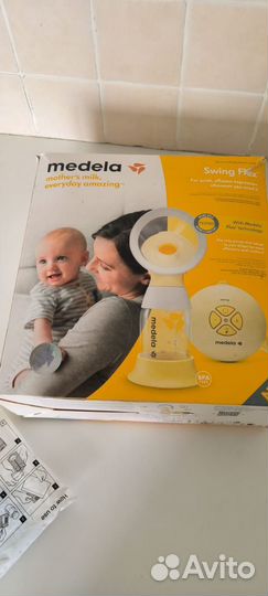 Молокоотсос medela электрический
