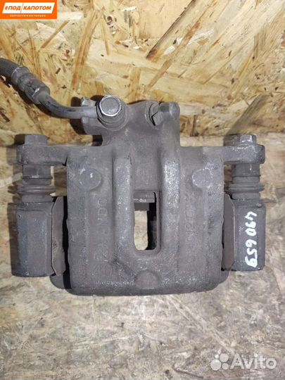 Суппорт тормозной задний левый Chevrolet Captiva