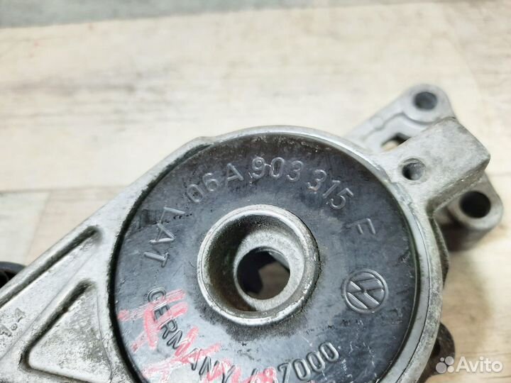 Натяжитель ремня AXW VW passat B6