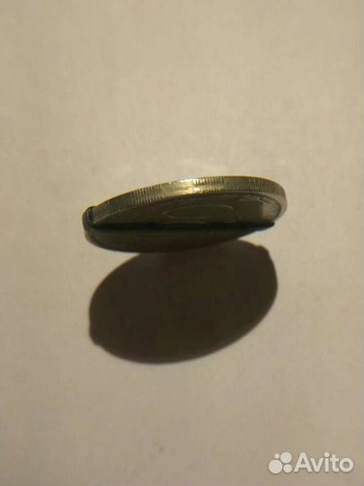 Монета 100 рублей 1993 года (брак)