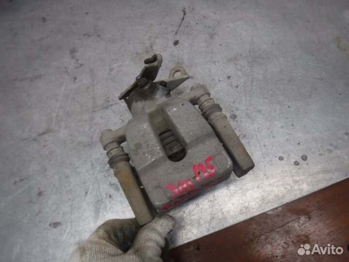 Суппорт задний правый Renault Fluence K4M 2011