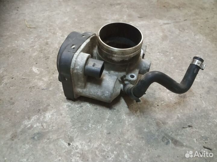 Дроссельная заслонка WV / Octavia 1.6 06А 133 062