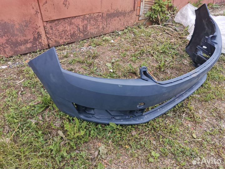 Бампер передний на рапид 1