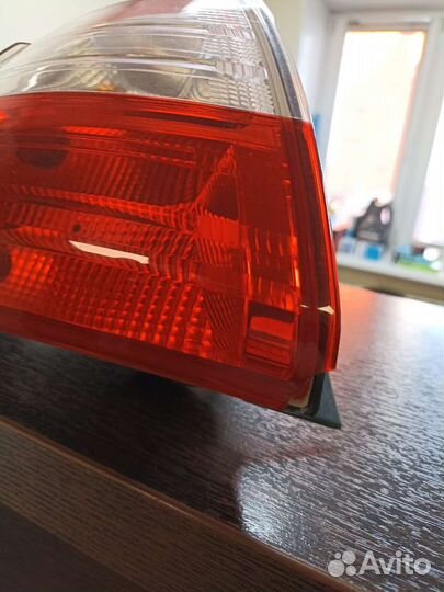 Задний левый внешний фонарь Ford Focus 3 седан