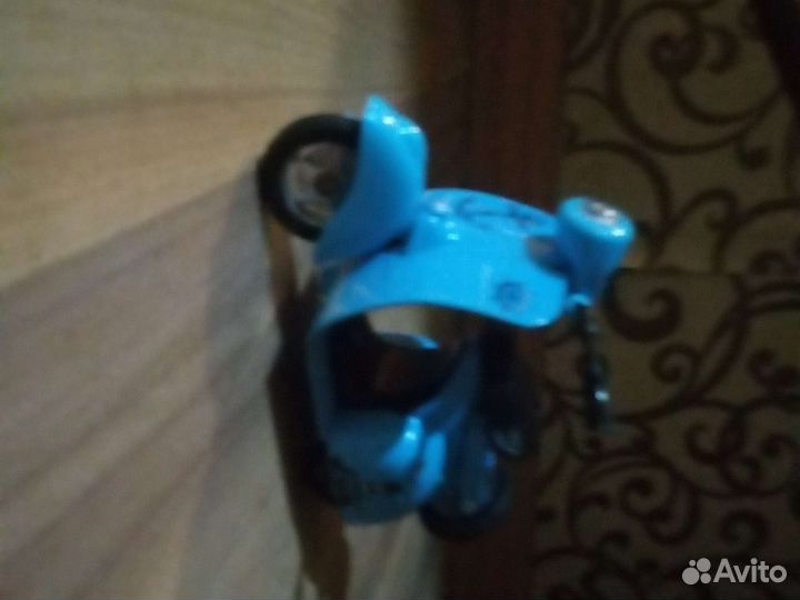 Игрушечный мотопед