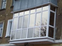 Остекление балкона окнами с тонировкой