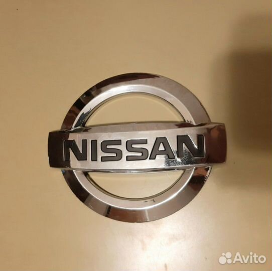 Эмблема Nissan