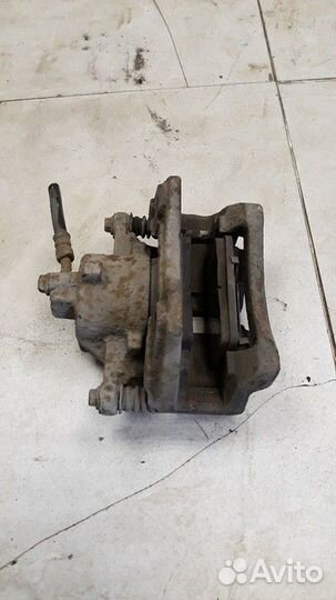 Суппорт передний правый Nissan Almera