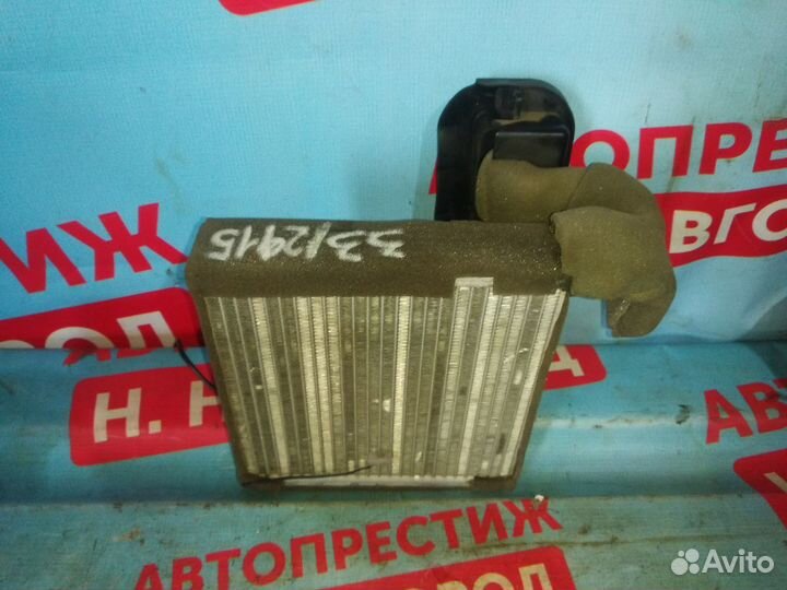 Радиатор печки отопителя Ниссан Тиида