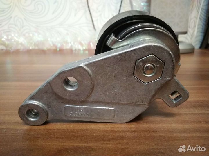 Натяжной ролик грм форд фокус