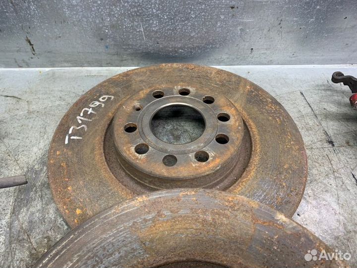 Суппорт тормозной задний левый Skoda Octavia (A5