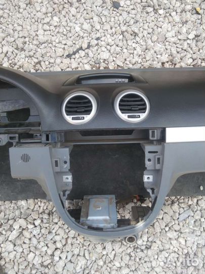 Торпеда Шевроле Лачетти