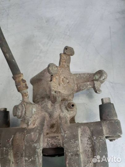 Суппорт тормозной задний Suzuki Swift 2 рест. 1999