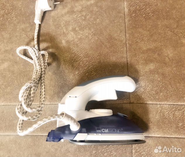 Утюги: большой Phillips и маленький дорожный