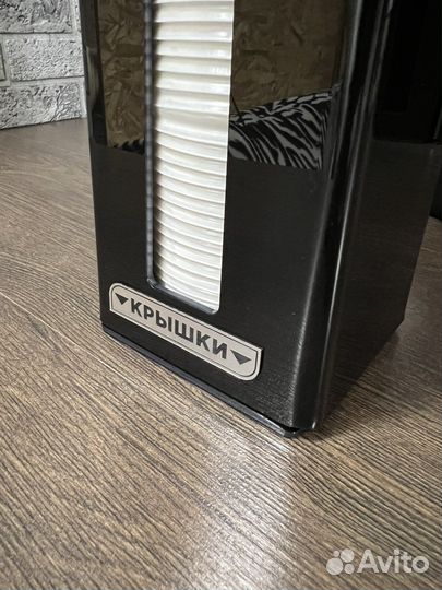 Диспенсер крышек