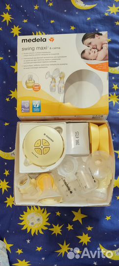 Молокоотсос medela swing maxi