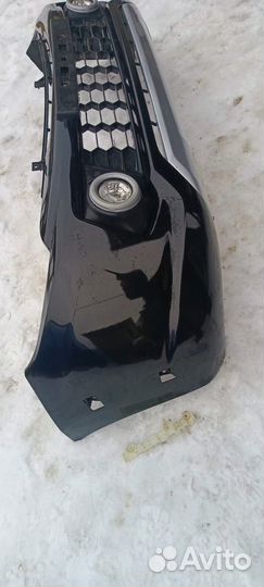 Бампер оригинальный mitsubishi l200