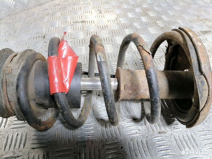 Стойка амортизатора п.л. Chevrolet Lacetti