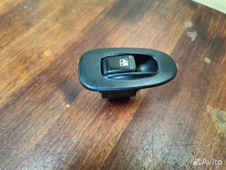 Кнопка стеклоподъемника двери Kia Spectra