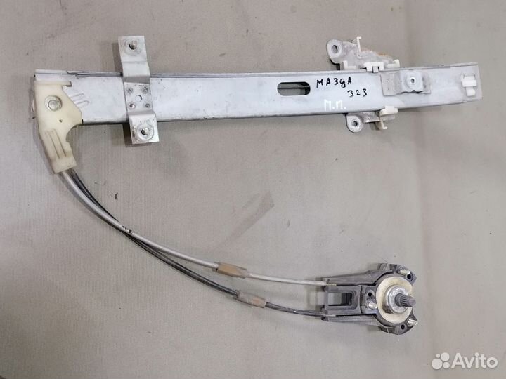 Стеклоподъемник перед.левый Mazda 323 1980-1989