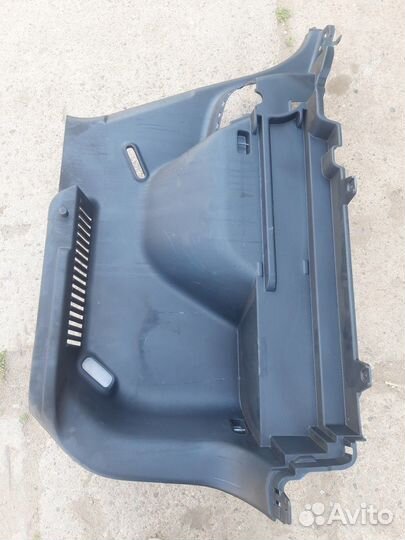 Обшивка багажника(левая) (Kia Seltos)