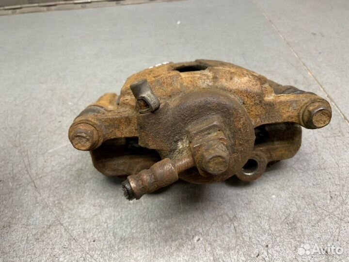 Суппорт передний левый Chevrolet Lanos седан 1.5