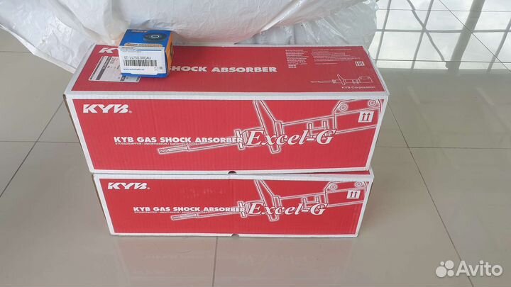 Новые передние амортизаторы Renault Fluence