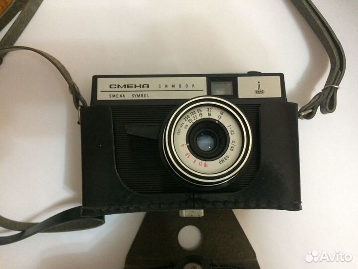 Фотоаппарат смена 8м и символ