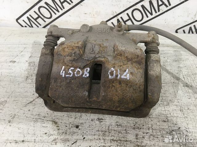 Суппорт тормозной передний левый Nissan Кашкай