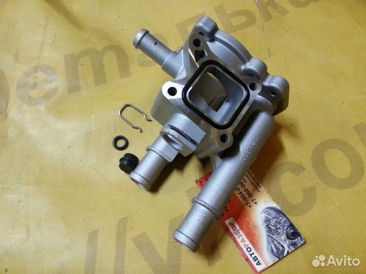 Корпус термостата новый Chevrolet Opel