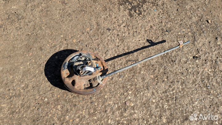 Ступица (кулак, цапфа) левая задняя Nissan Micra K12E