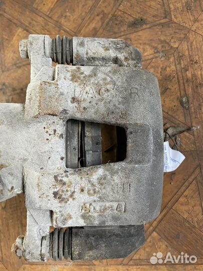 Chevrolet lacetti супорт тормозной передний правый