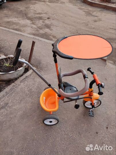 Трёхколёсный велосипед с ручкой