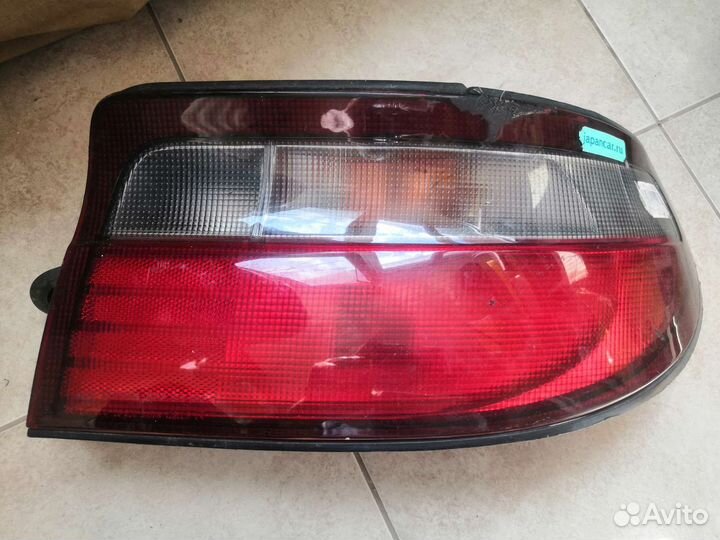 Фонари задние, габарит левый Toyota Carina ST190