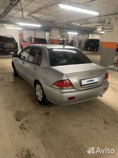 Mitsubishi Lancer 1.6 МТ, 2006, 174 000 км