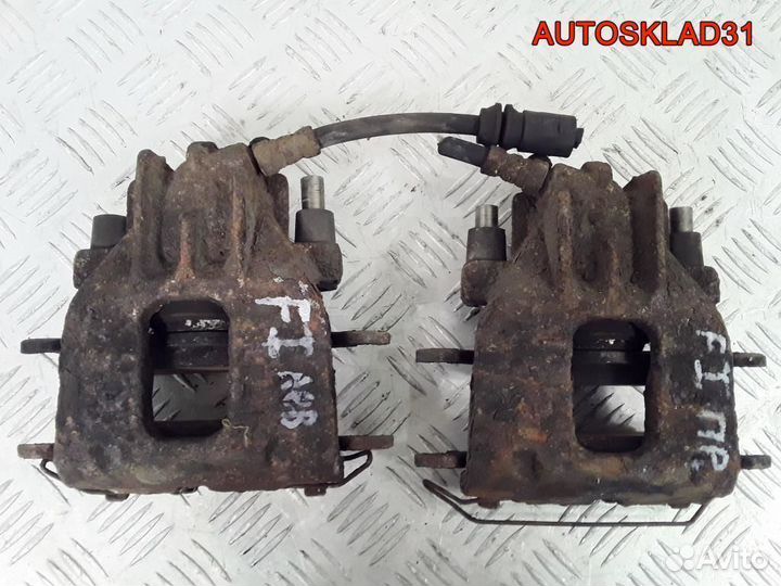 Суппорт тормозной передний Ford Focus 11478514