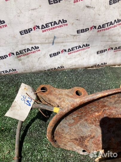 Кулак поворотный передний левый Mitsubishi Lancer