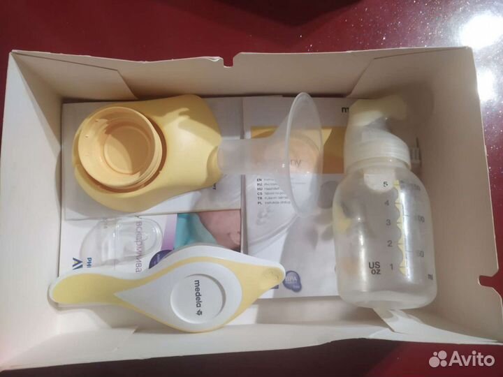 Молокоотсос medela ручной