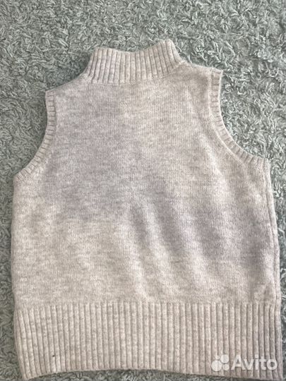 Жилетка меховая женская