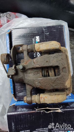 Суппорт тормозной задний kia rio 3 дорестайл