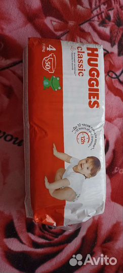 Памперсы детские 4