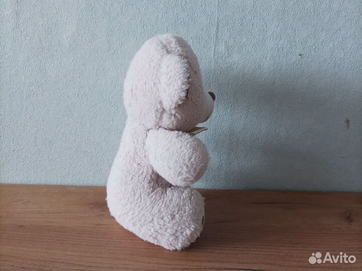 Плюшевый медведь в хорошем состоянии