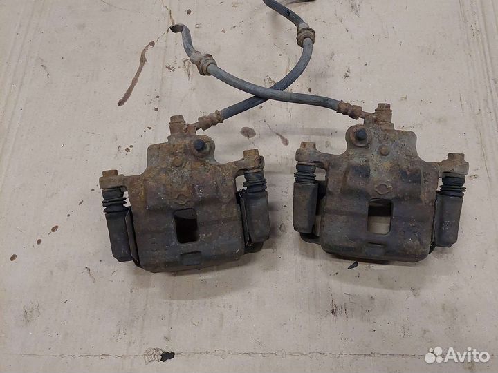 Суппорт передний Nissan Almera N15