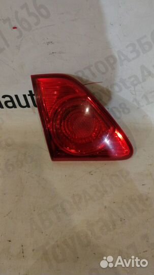 Фонарь в крышку багажника Тойота Королла Е150