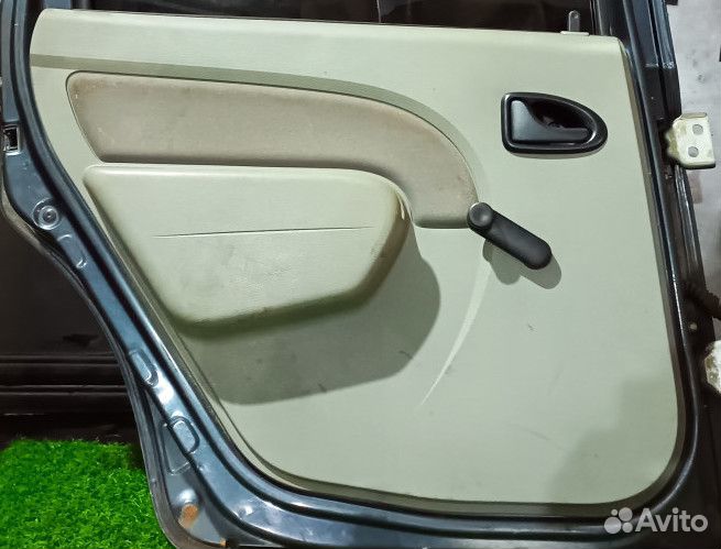 Обшивка двери задней левой Renault Logan