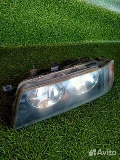 Фара передняя левая для Митсубиси Диамант 3.0л 95г