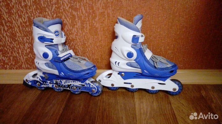 Роликовые коньки