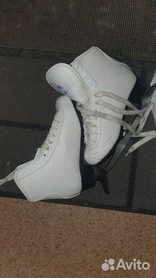 Роликовые коньки